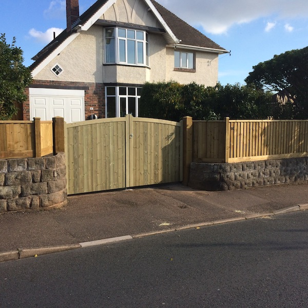 arched top double gate and fence